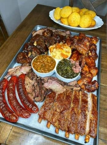 Platter of grilled meats and sides